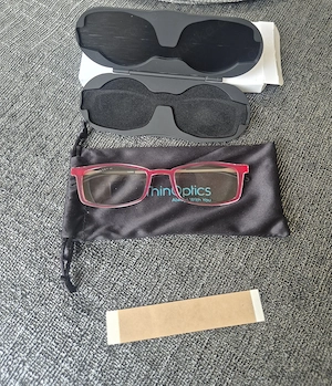 ThinOptics Lesebrille, in Rot und Milano-Magnetetui, für Damen und Herren,