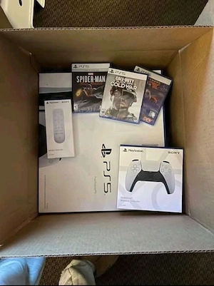 Sony PlayStation 5 PS5 mit Controller und Spielen