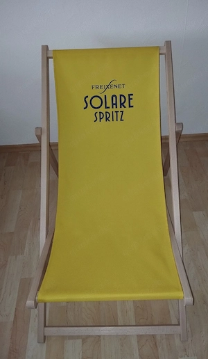 Verkaufe ein Holzliegestuhl von Freixenet Solare Spritz 