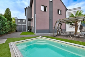 Vielseitiges Wohninvestment mit Pool, Ausbaureserve und attraktiven Mieteinnahmen