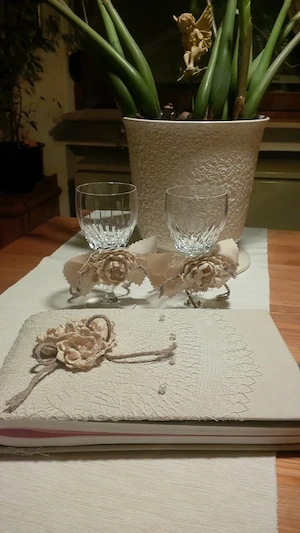 Elegant handmade guestbook with matching crystal glasses