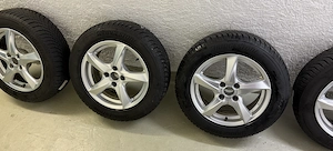Satz Winterkompletträder 205 60 16 Bridgestone auf Alufelge 