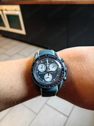 Herrenuhr mit Omega-Funktion