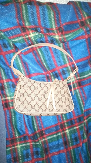 Gucci Handtasche.